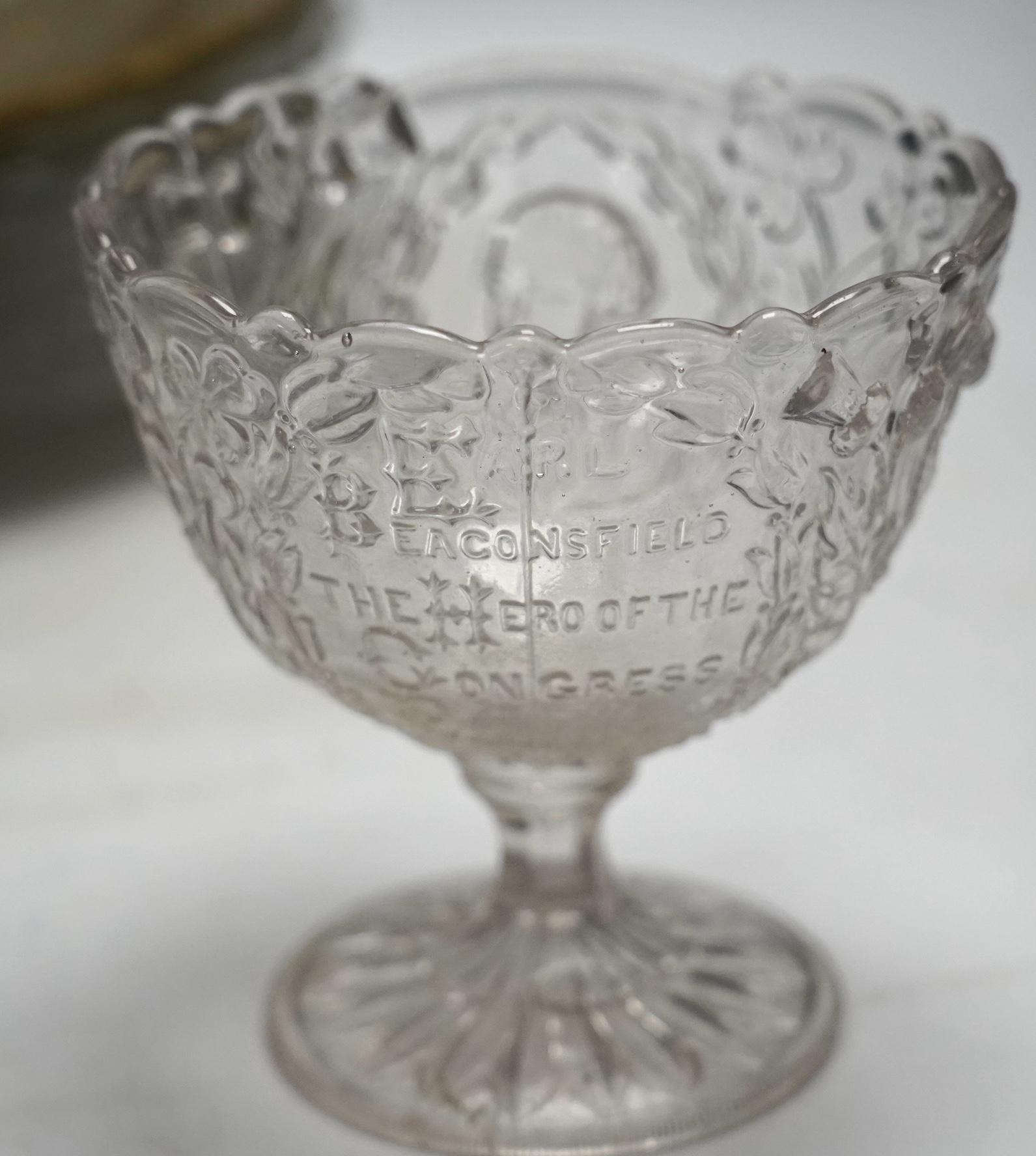 Nine pieces of Royal and other commemorative press moulded glass, Victorian to George VI, largest 30cm. Condition - good